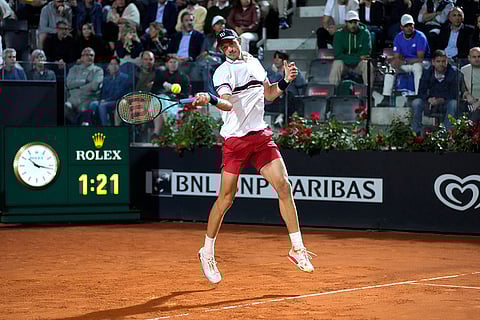 Nicolas Jarry returns the ball to Tommy Paul